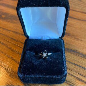 Ring with black stone